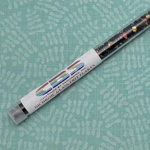 Dichroic Frit Flakes Rainbow on Black CBS One Ounce Tube Glass 96 COE Dichroic Fusible