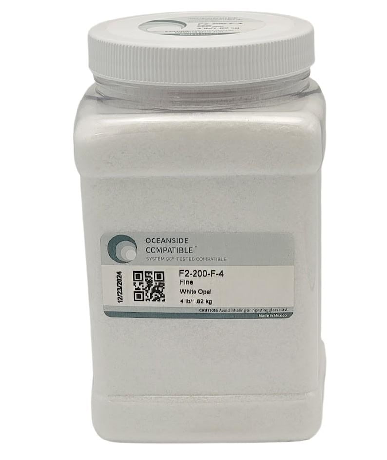 May include: A white plastic jar with a white lid containing white opal glass beads. The jar has a label that reads "Oceanside Compatible System 96 Tested Compatible F2-200-F-4 Fine White Opal 4 lb/1.82 kg CAUTION: Avoid inhaling or ingesting glass dust Made in Mexico".