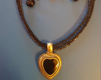 Vintage black beads and silver heart necklace with 2 sets of black and silver earrings