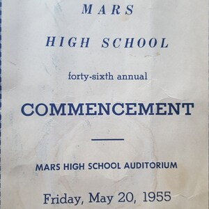 May include: Vintage Mars High School Commencement announcement from 1955. The blue text on a cream-colored background reads "COMMENCEMENT" and "Friday, May 20, 1955, 8:00 P. M." The announcement is framed with a decorative border.