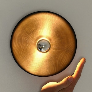Round black wall lamp in burnt wood Decoration