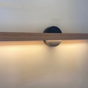 Horizontal wall light in natural wood and minimalist black Decoration