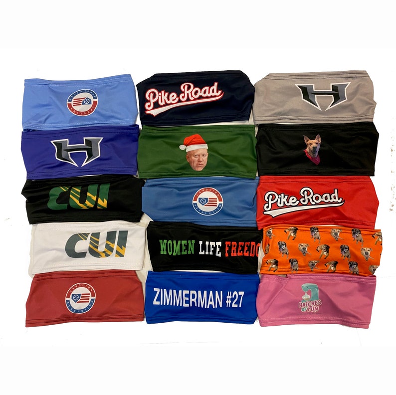 May include: A collection of 15 colorful headbands with various designs and text. Some headbands feature logos, others have text like "Pike Road", "Women Life Freedom", and "Zimmerman #27".