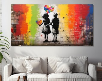 Puede incluir: Una impresión de arte de graffiti colorida con dos figuras tomadas de la mano, con un globo en forma de corazón hecho de piezas de rompecabezas sobre ellos. El fondo es una pared de ladrillo con salpicaduras de pintura de colores.