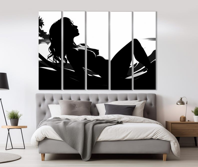 May include: A black and white abstract art print of a woman's silhouette lying down. The print is divided into three panels.