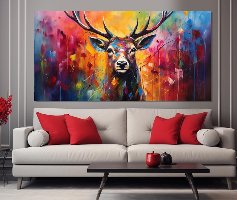 May include: A colourful abstract painting of a deer with large antlers. The background is a mix of vibrant colours, including blue, purple, yellow, and orange.