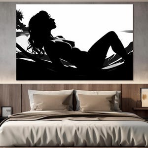 May include: Black and white silhouette of a person lying down on a bed of leaves. The person's face is turned to the side and their eyes are closed. The background is white.