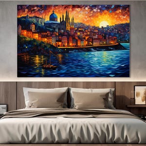 K&ouml;nnte beinhalten: Ein Gem&auml;lde, das eine Skyline einer Stadt bei Sonnenuntergang mit einem Segelboot im Wasser zeigt. Die Stadt ist auf einem H&uuml;gel gebaut und hat eine gro&szlig;e Kirche mit einer Kuppel. Der Himmel ist orange und rosa mit Wolken. Das Wasser ist blau und gr&uuml;n mit Wellen.