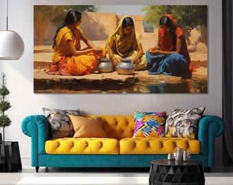 May include: A large canvas print depicts three women in traditional Indian attire, seated near water. The women wear vibrant orange, yellow, and blue clothing. Silver pots are placed in front of them. The artwork is displayed above a teal and yellow sofa.