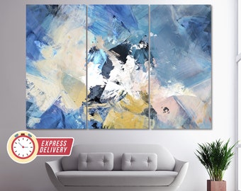 Puede incluir: Impresión de arte abstracto con un diseño de tres paneles. La impresión presenta una mezcla de pinceladas azules, amarillas, blancas y rosadas.