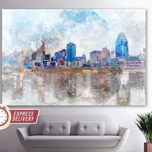 May include: A watercolor painting of the Cincinnati skyline with the Ohio River in the foreground. The painting features a bridge, buildings, and a cloudy sky.