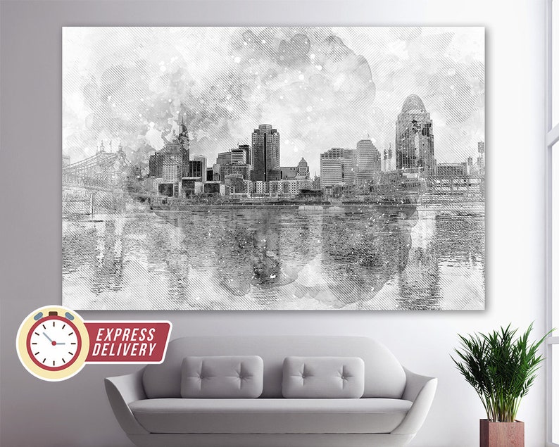 May include: A black and white watercolor illustration of a city skyline with buildings reflected in the water. The skyline is set against a cloudy sky with a watercolor effect.