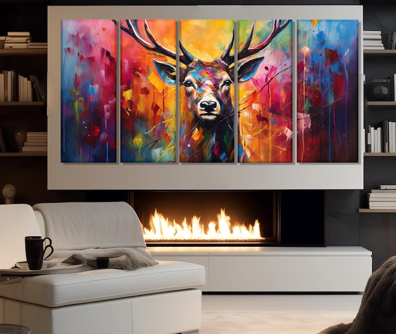 May include: A multi-panel canvas print featuring a colourful abstract painting of a deer's head. The deer is depicted in a vibrant palette of blues, greens, oranges, and reds, with a blurred background.