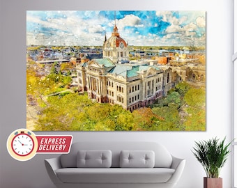 Puede incluir: Una pintura de acuarela de un edificio histórico de juzgado con una torre del reloj. El edificio está rodeado de árboles y un paisaje urbano en el fondo. La pintura tiene un aspecto vintage y descolorido.