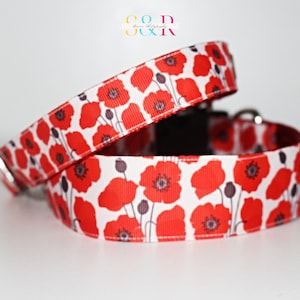 May include: Red poppy flower print dog collar with a silver buckle.