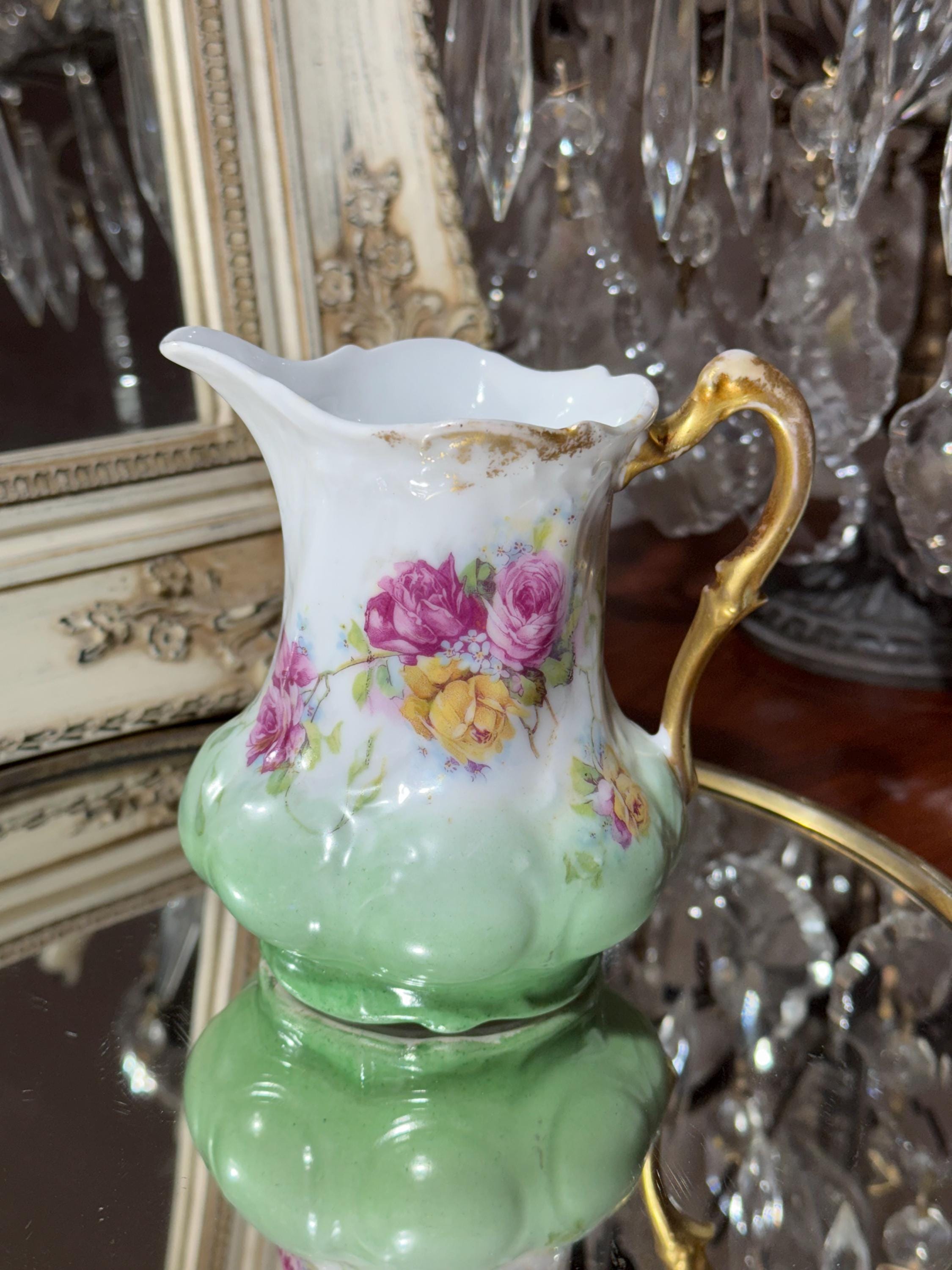 Magnificent Limoges porcelain creamer. Rose decoration. Early 20th century.