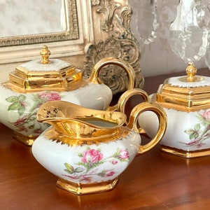 Incredible Limoges porcelain coffee service. Signed SL Circa 1950.