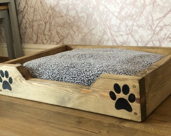 Solid wooden dog or cat bed with rustic oak finish