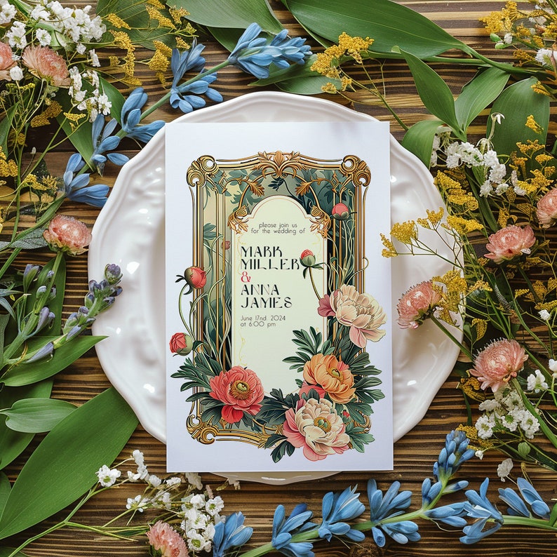 May include: A wedding invitation with a floral design. The invitation is framed with a gold border and features a floral pattern with pink, white, and green flowers. The text on the invitation reads "Please join us for the wedding of Mark Miller & Anna James June 17th 2024 at 6:00 pm".