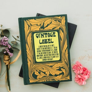 May include: A vintage green book with a yellow and gold decorative border. The book's title is "Vintage Label" and the text below reads "Lorem ipsum dolor sit amet, consectetur adipiscing elit, sed do eiusmod tempor incididunt ut labore et dolore magna aliqua. Ut enim ad minim veniam, quis nostrud exercitation ullamco laboris nisi ut aliquip ex ea commodo consequat."