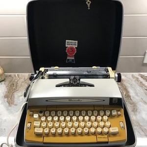 Vintage 1960's  JEWELED ESCAPEMENT Ruby Gem Smith Corona Chancellor Electric Typewriter With Case and Key - clean and works great**