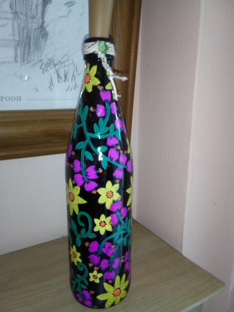 Hand painted bottle light with pink and yellow flower design