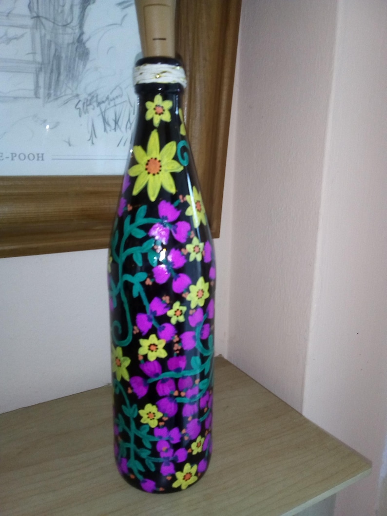 Hand painted bottle light with pink and yellow flower design
