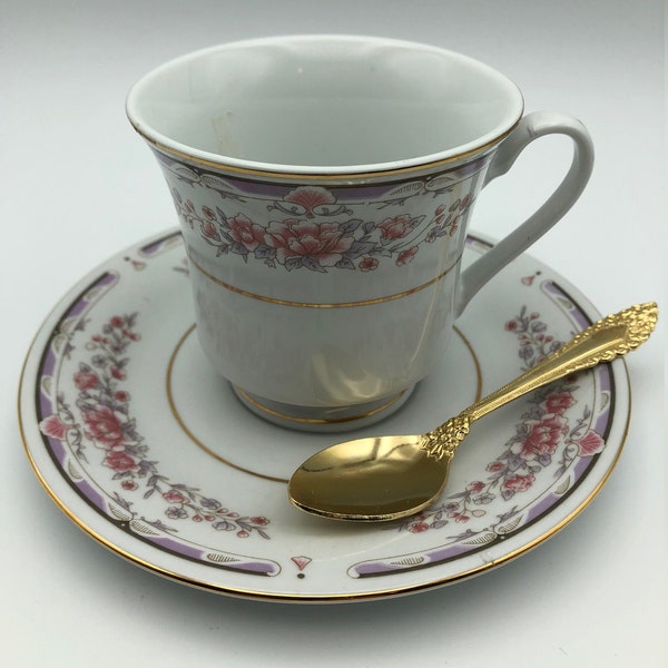 Vintage Truly Tasteful Fine China Footed Cup and Saucer with Golden Spoon.  Pink Peonies and Lavender Border with Brilliant Gold Trim.