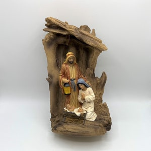 Lighted Nativity Scene Joseph Mary and Baby Jesus in Stable. Joseph with Lantern Jesus in a Manger