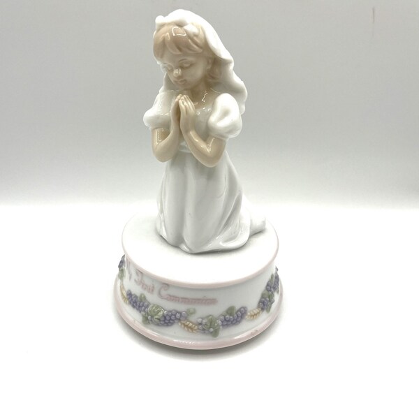 Musical First Communion Figurine Girl Kneeling and Praying on Platform with My First Communion and Garland of Grapes Plays The Lords Prayer