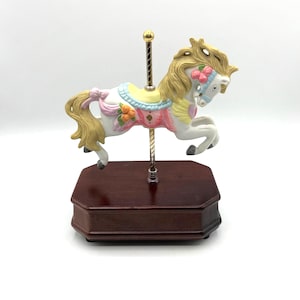 Musical Carousel Horse on Brass Post and Wooden Platform Revolves as You&#39;re My Hero plays. Highly Detailed.