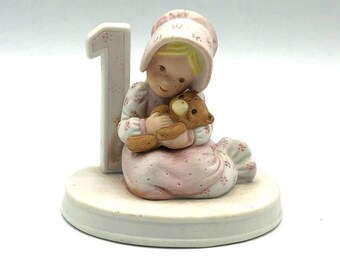 Vintage 1983 Holly Hobbie Birthday Collection Porcelain Figurine, Year 1.  Fine Hand Painted Bisque Porcelain. Little girl with teddy bear.