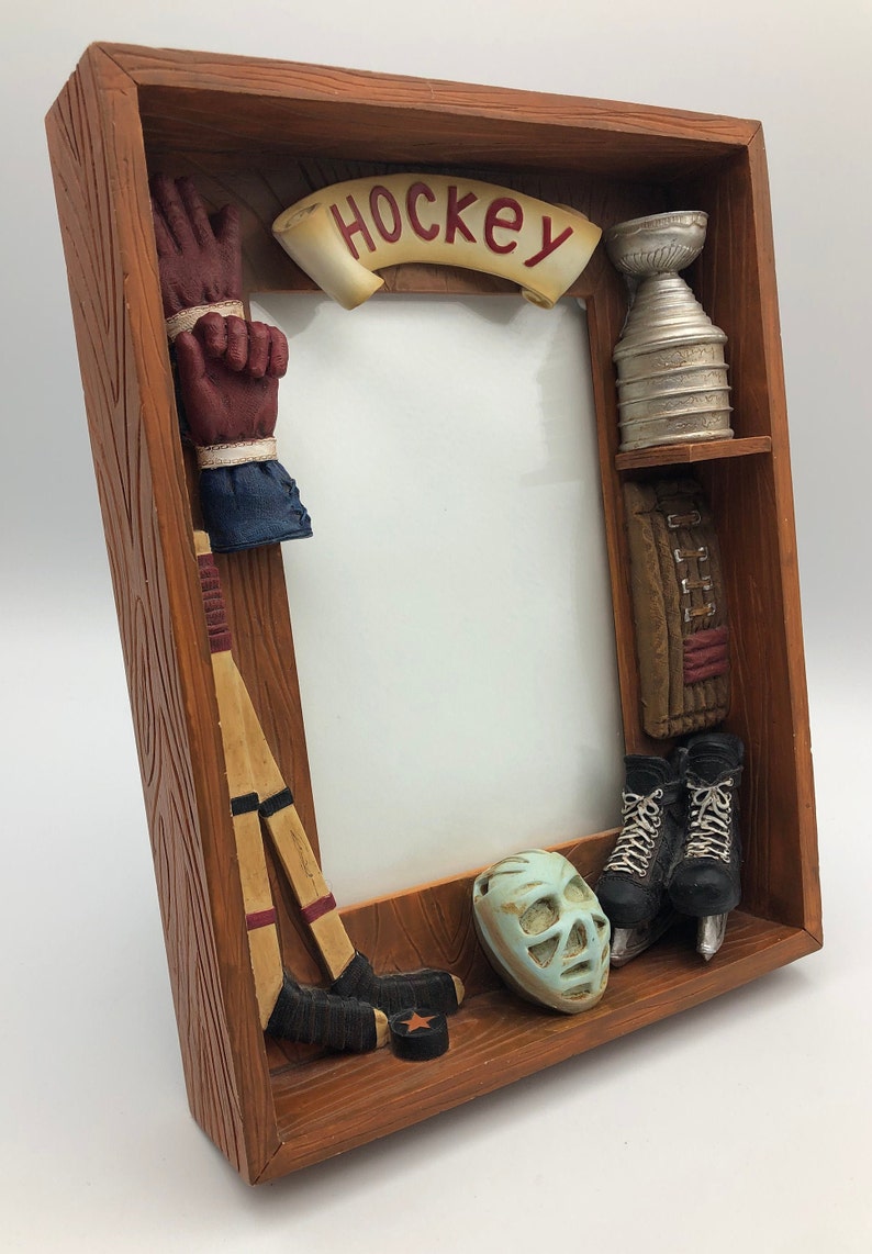 6.5 x 8.5 x 1.5 Dimensional Hockey Display Frame with Hockey Sticks Pads and Trophy Puck Ice Skates Gloves Helmet with Faceshield