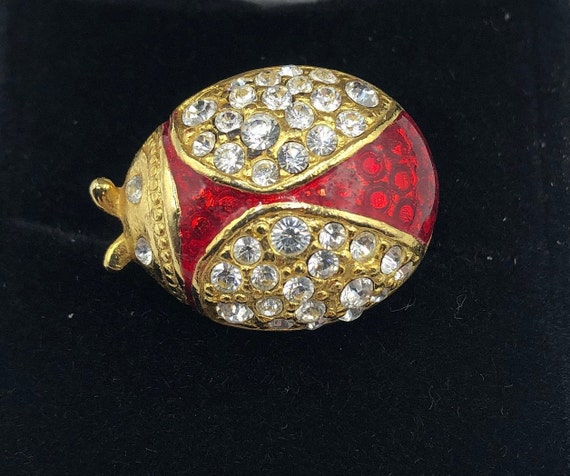 Vintage Small Lady Bug Brooch. Goldtone Setting, Crystal Rhinestones and Red Enameled Body.  Beautiful fashion accent perfect for spring.