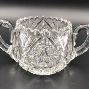 Lead Crystal Bowl Deeply Cut with Intricate design and Double Handles.  Brilliantly captures each ray of light. 6.5&quot; wide and 3&quot; high