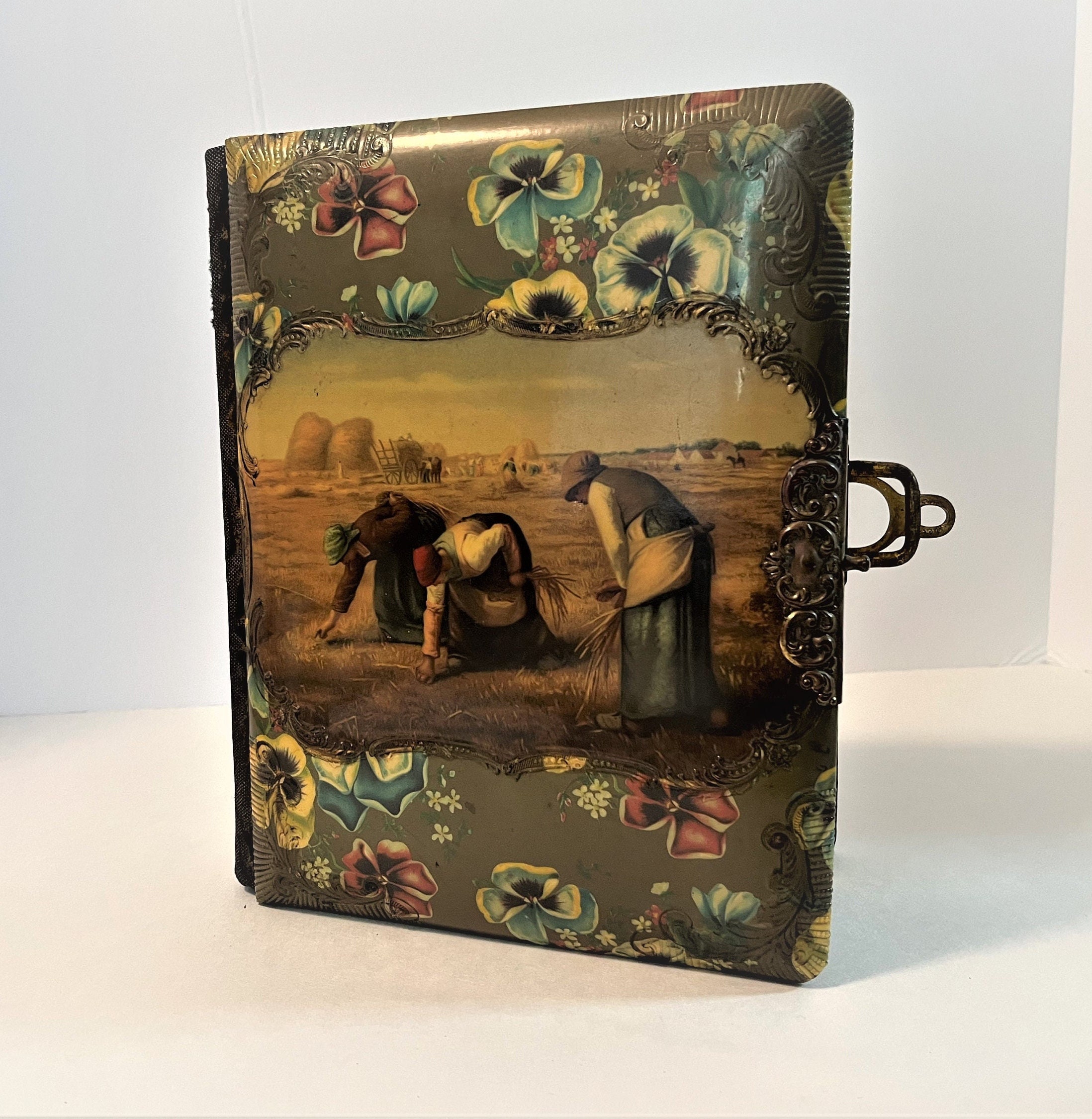 Antique Victorian Photo Album. Celluloid Front Cover with Image of The Gleaners, Spine and Back Cover are Fabric. Brass Expandable Latch.
