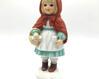 Vintage 1984 Enesco Porcelain Doll “Little Red Riding Hood” from Storybook Dolls Collection. 2.5” x 3.3” x 7.5” tall. Excellent Condition