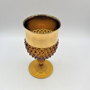 Mid Century Stemmed Goblet Tiara Indiana Glass Amber with Diamond Point Pattern with Gold Cuff Rim.  6.5&quot; tall Capacity 8 oz.