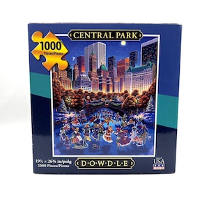 Eric Dowdle 1000 Piece Central Park Puzzle in Keepsake Box. 19-1/4&quot; x 27-5/8&quot; completed size.