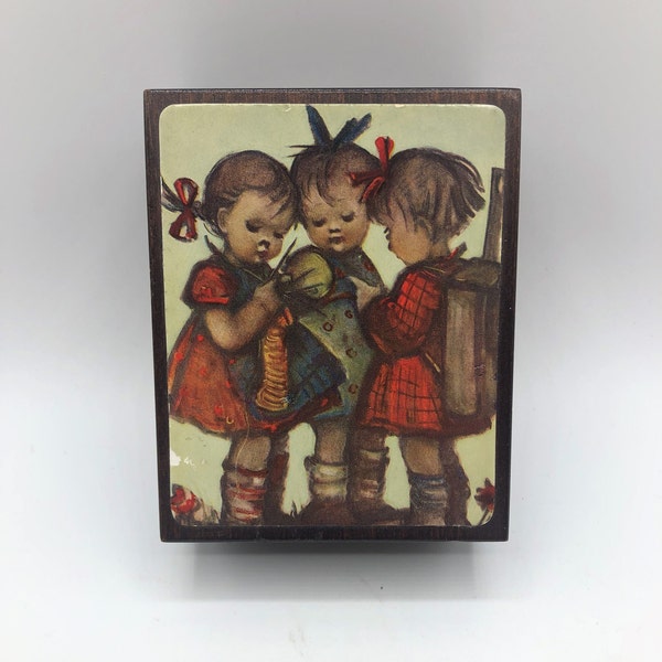 Reuge Music Box with Swiss Musical Movement, Hummel School Girls image on the top. Plays the melody "Strangers In The Night"