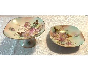 Escolha um prato ou tigela de pedestal antigo Schumann Arzberg Bavaria com estampa floral de rosas silvestres em tons pastel e detalhes dourados. Fabricado na Alemanha. 19 cm de diâmetro.