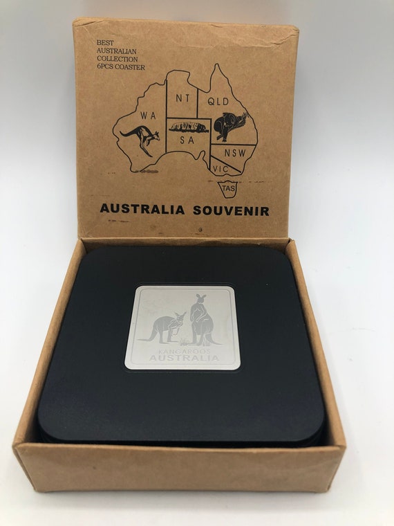 Best Australian Collection, 6 piece Coaster Set. Black Vinyl with 6 Different Engraved Metal Images of Kangaroos.  In original box.