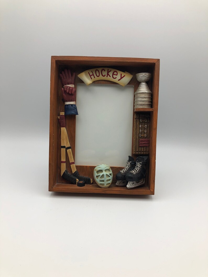 6.5 x 8.5 x 1.5 Dimensional Hockey Display Frame with Hockey Sticks Pads and Trophy Puck Ice Skates Gloves Helmet with Faceshield