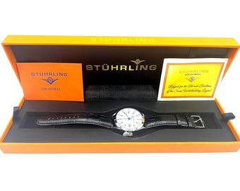 Stuhrling Original Mens Watch With White Dial Black Leather Band Stainless Steel Case Water Resistant 100 Meters Date Display
