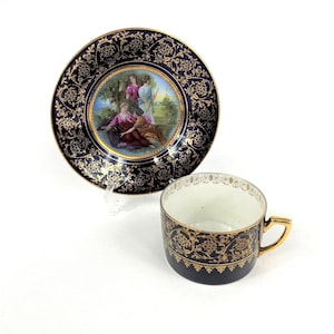 Antique Royal Vienna Cup and Saucer Cobalt Blue with Gold Details and Victorian Ladies.