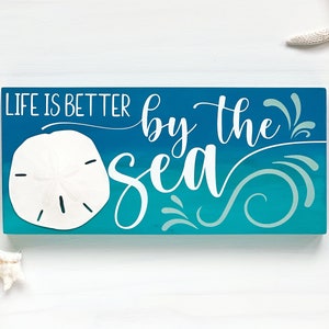 Life Is Better By The Sea Sign Coastal Themed Sign Coastal Decor Beach House Decor Beachy Sign Beach Room Decor Beach Lover Gift Sand Dollar