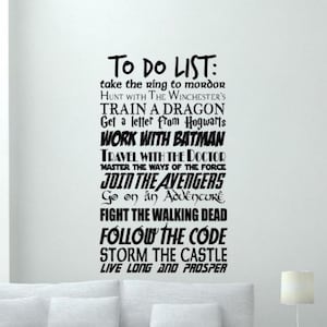 May include: Black vinyl wall sticker featuring a list of fictional tasks. The text reads "TO DO LIST: take the ring to mordor, HUNT WITH THE WINCHESTER'S, TRAIN A DRAGON, Get a letter from Hogwarts, WORK WITH BATMAN, TRAVEL WITH THE DOCTOR, JOIN THE AVENGERS, FIGHT THE WALKING DEAD."