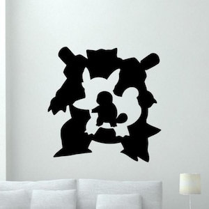 May include: Black silhouette wall decal of three Pokemon characters: Squirtle, Wartortle, and Blastoise. The characters are arranged in a stacked formation, with Squirtle at the bottom, Wartortle in the middle, and Blastoise at the top.