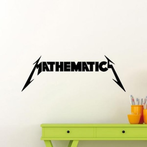 May include: Black wall decal featuring the word "MATHEMATICS" in a stylized font with lightning bolt accents. The decal is mounted on a white wall above a lime green table with orange containers.