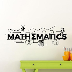 May include: Black and white wall decal displaying the word "MATHEMATICS" with mathematical symbols and illustrations. The design includes a lightbulb, apple, and geometric shapes. A lime green table with orange containers and pencils is below the decal.